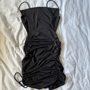 Black body con dress with cinch on side